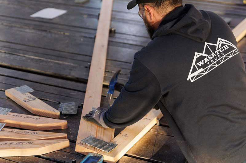 A truss connector putting together trusses