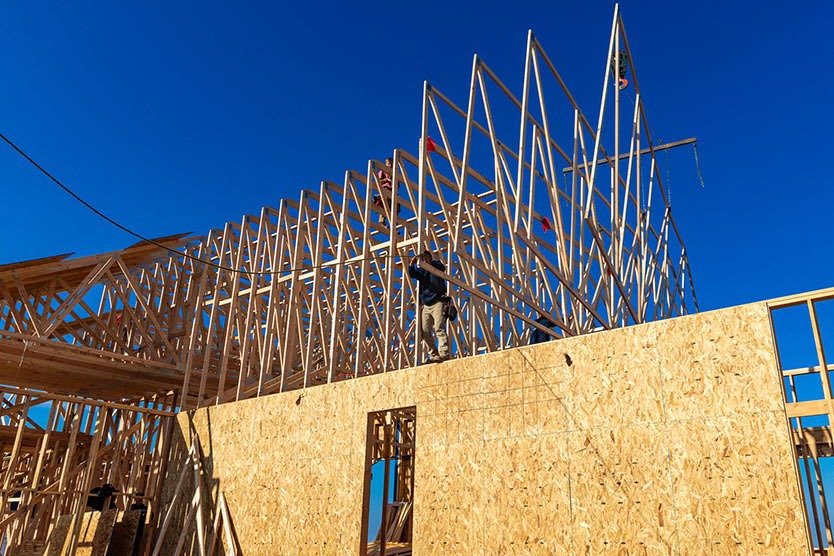 Roof trusses being installed